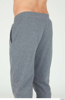 Simeon buttock dressed grey joggers sports thigh 0002.jpg